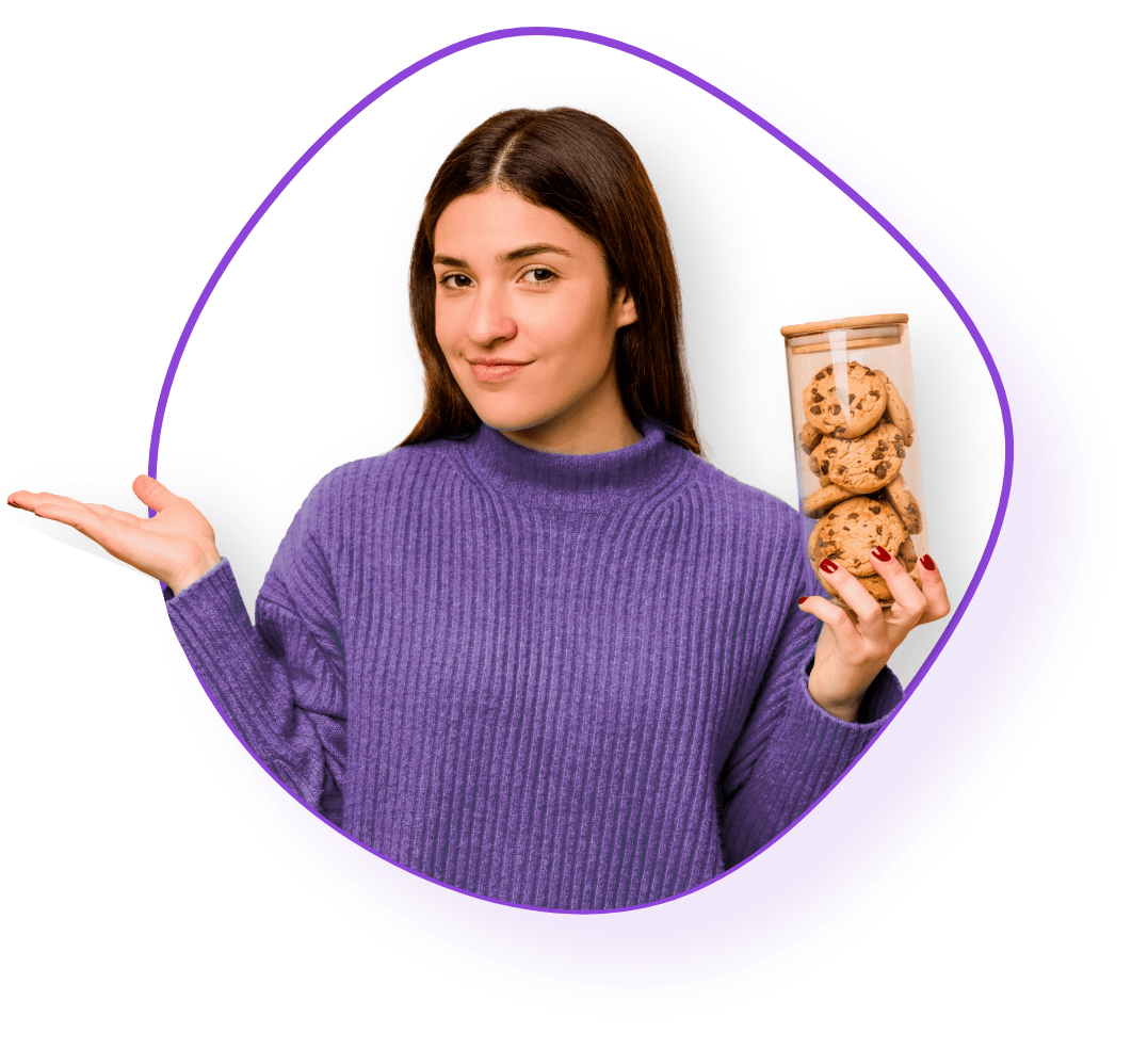 Woman holding jar of cookies